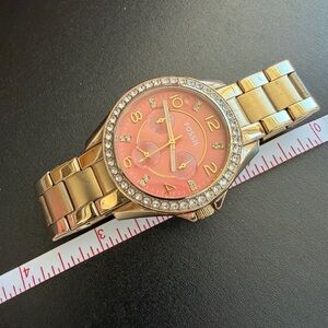 Women’s Fossil watch gold toned and pink